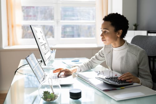 Woman working on computer in office